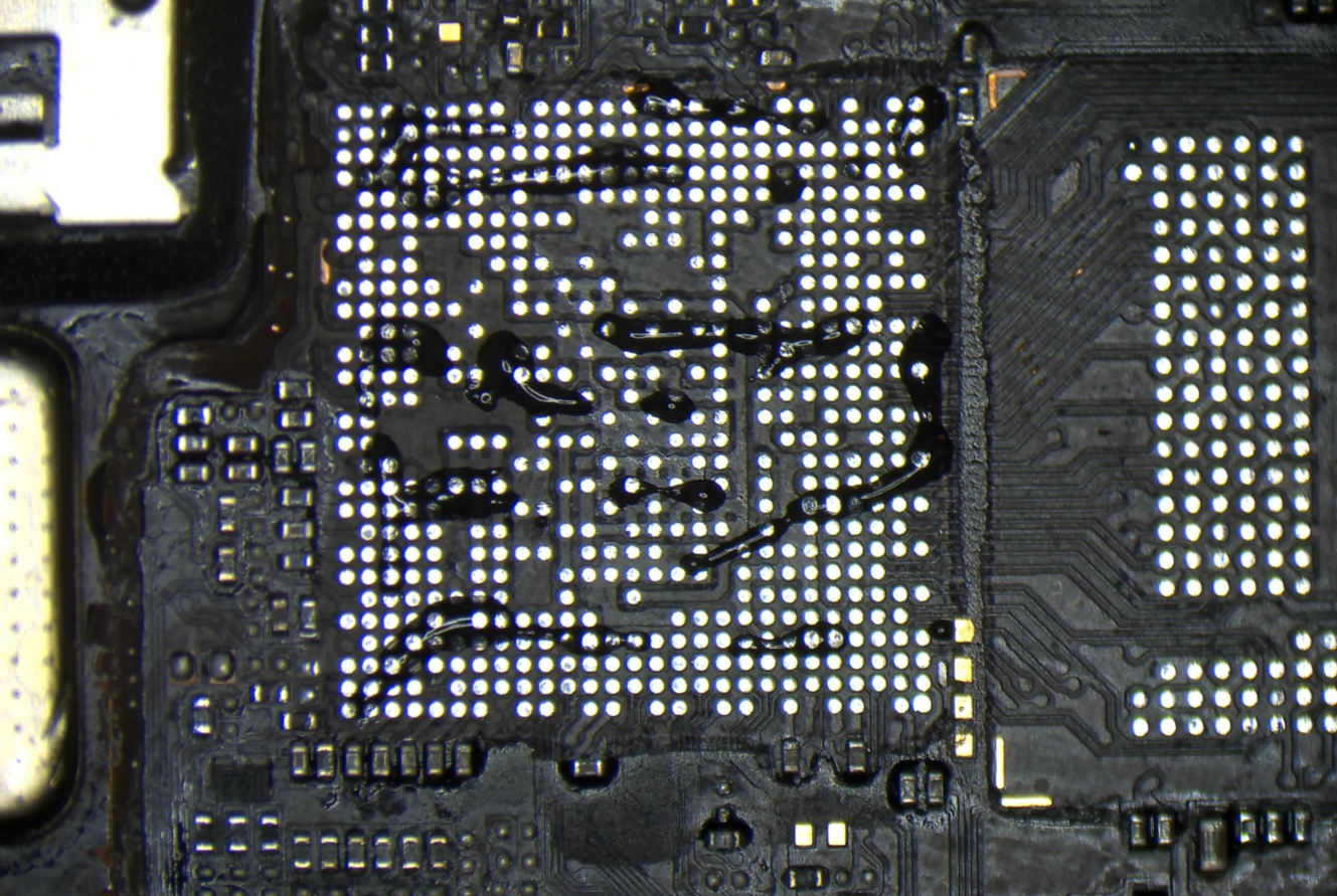 Small dots of flux on the CPU pads on the board